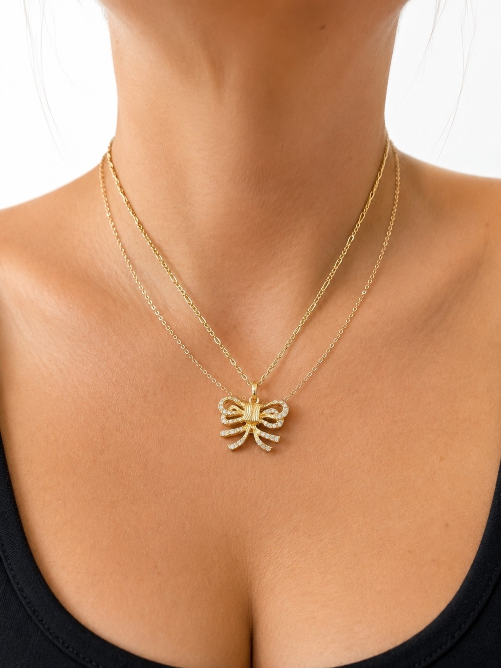 Celine Triomphe and crystal ribbon bow Necklace
